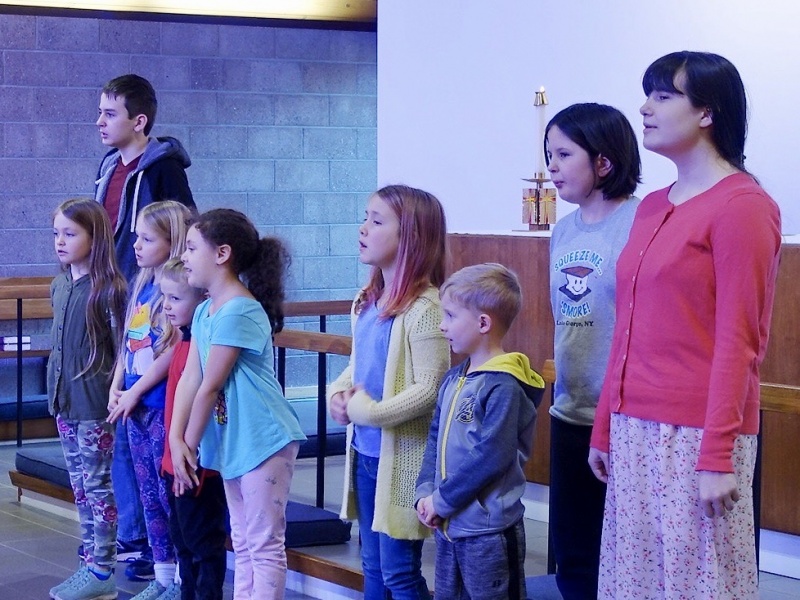 Children sing "Good News, Great Joy"