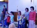 Children sing "Good News, Great Joy"