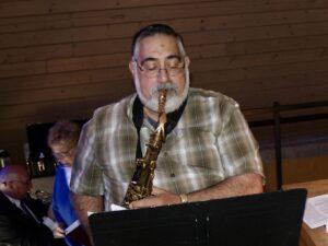 Frank Vasi performing a saxophone solo with Martha Medford accompanying on organ during the August 16, 2026 worship service at Cheshire Lutheran Church